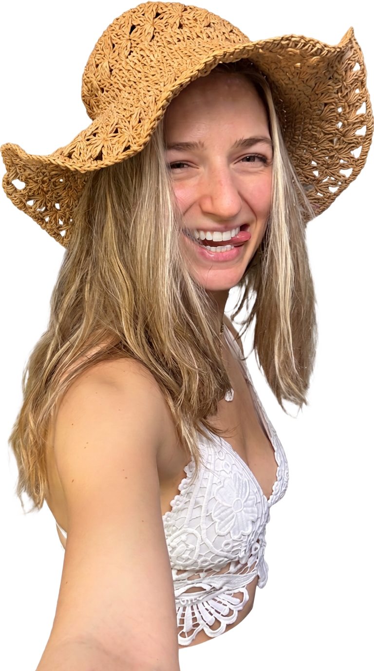 Frauke laughing in a straw hat